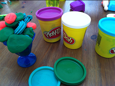 playdoh on a wooden table