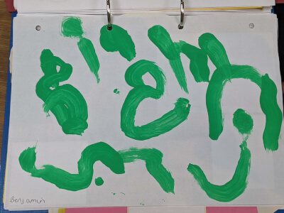 Child's attempt to paint his name 